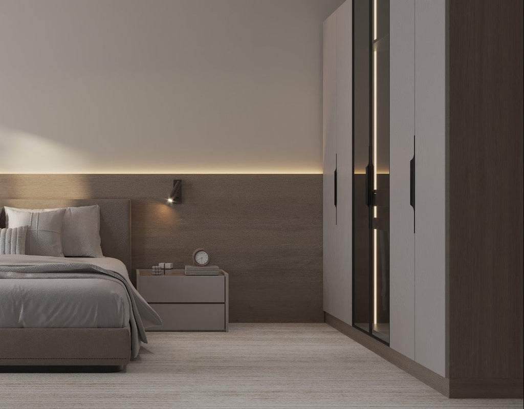 Modern bedroom with a bed, nightstands, and wall lighting.